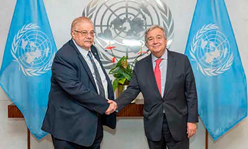 Doctor Paul Oquist con el secretario general de la ONU Antonio Guterres